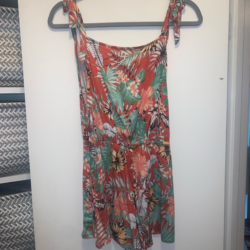 Tropical romper size XS. Perfect for summer, spring break, and more!